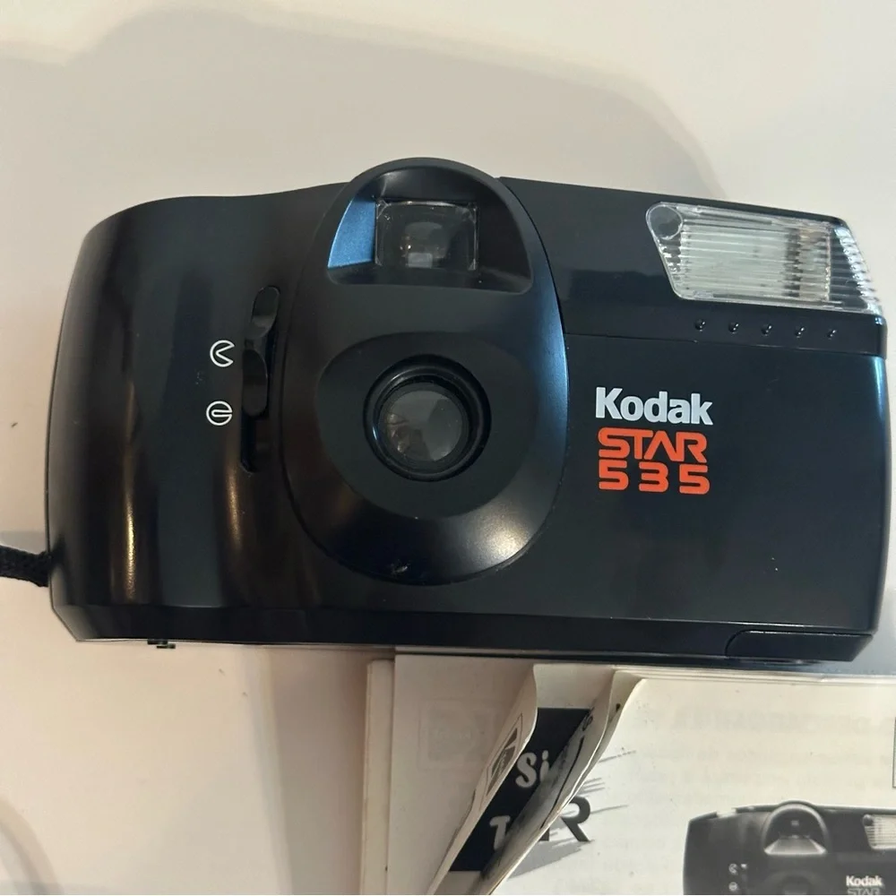 Kodak Star 535 Black 35mm Film Camera w/ Original Manual UNTESTED FOR PARTS